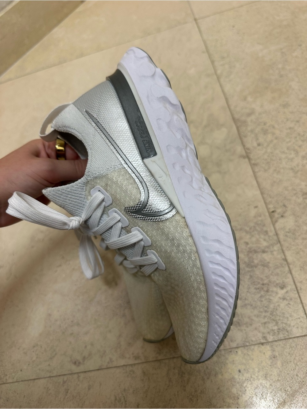 Nike Women’s React Flyknit White Metallic Sneaker